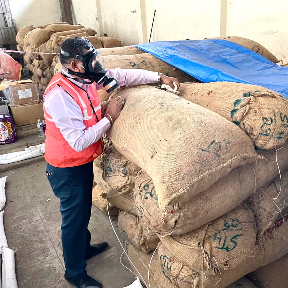 Fumigation operator with commodity sacks
